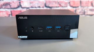 The Asus PN53 Mini PC on a desk