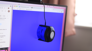 A colour calibrator on a LG monitor