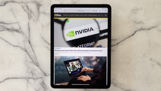 A photograph of the Apple iPad Air on a marbled table