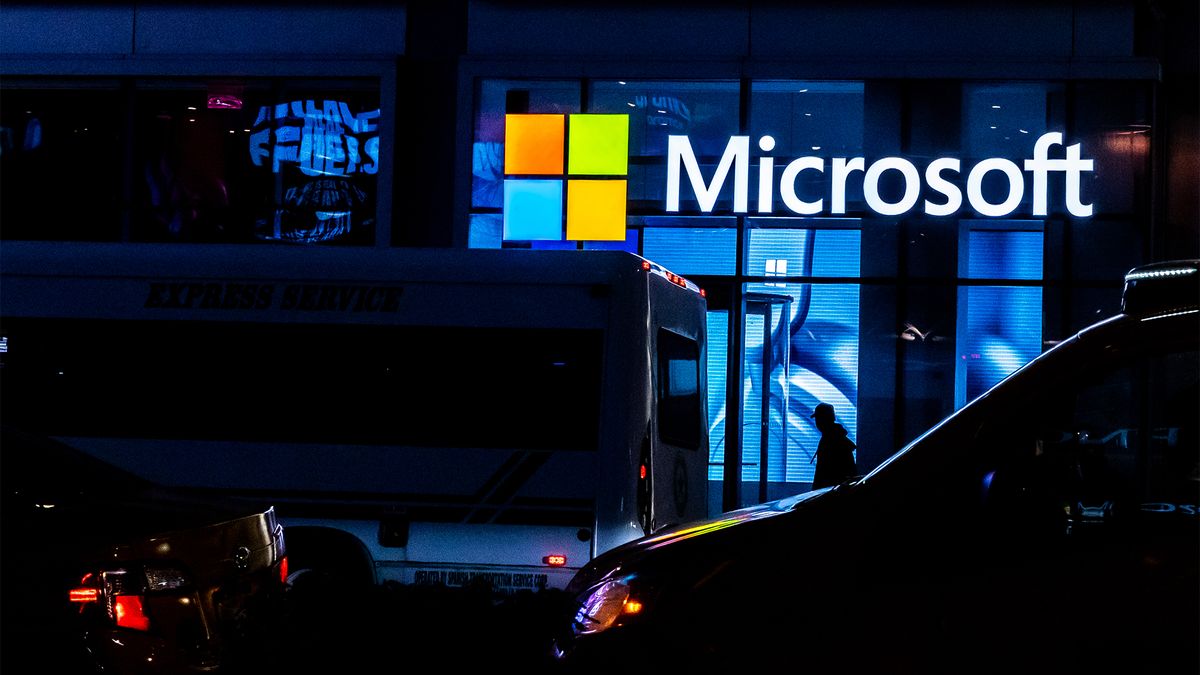 Logo and branding of Microsoft, developer of the MAI-1 AI model, pictured at night in New York City.