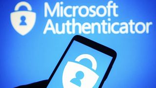 Microsoft Authenticator logo on smarthpone in front of blue background with 'Microsoft Authenticator' written in white