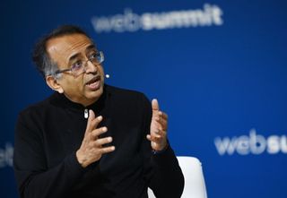 VMware CEO Raghu Raghuram speaking on stage at Web Summit