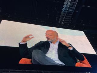 Uber CEO Dara Khosrowshahi talking to Oracle CEO Safra Catz at Oracle CloudWorld 2023