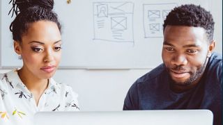 Whitepaper from ServiceNow on steps to proactively manage data privacy and protection, with image of two colleagues looking at a laptop screen
