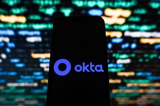 Okta logo displayed on a smartphone