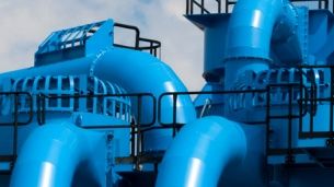 A whitepaper with blue industrial image on cover, on how to achieve cloud-enabled manufacturing