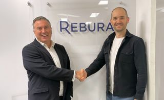 David Grant, CEO at Westcon-Comstor pictured shaking hands with Aaron Rees, Founder and CEO at Rebura.