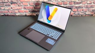 The Asus Vivobook S16 on a desk