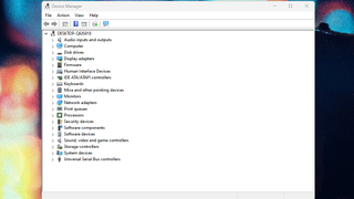 A screenshot of the Windows 11 desktop showing the Device Manager windows