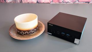 The Asus PN53 Mini PC on a desk