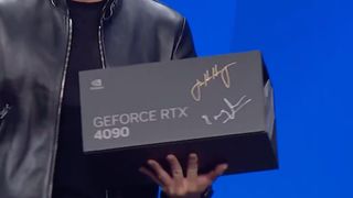 Nvidia CEO Jensen Huang holding a custom 4090 founders edition GPU.