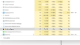 A screenshot of the Windows 11 task manager window, with the Windows Explorer process highlighted and the rest blurred