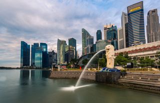 Singapore's skyline with clouds in the background
