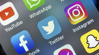Several prominent social media apps on a smartphone screen