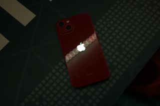 The iPhone's Apple logo illuminated